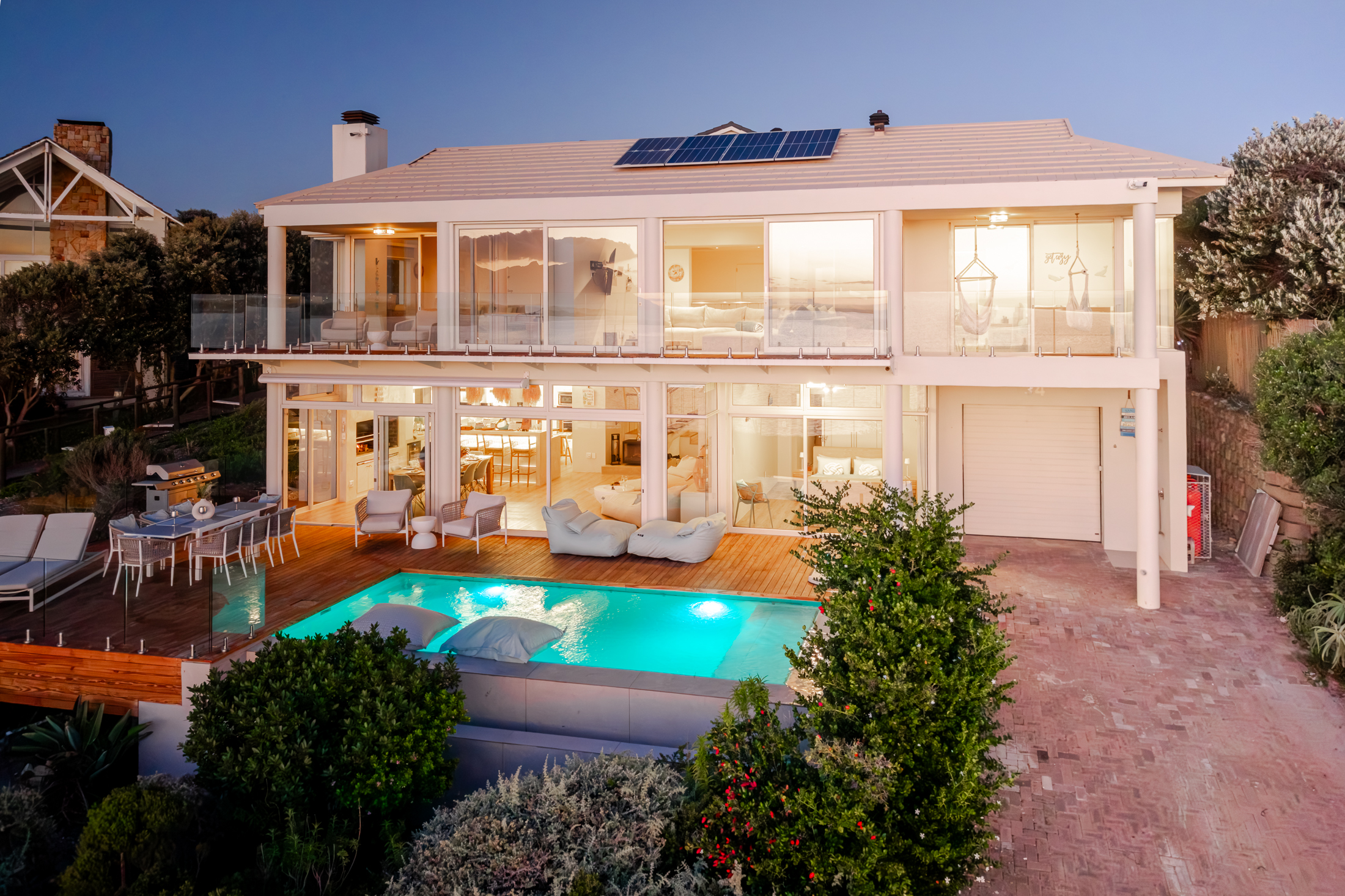 MBIZI lagoon house at night — the private retreat that awaits after a 90-minute drive from Cape Town